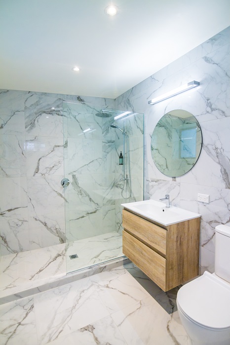 New Wave Construction Titirangi Bathroom with White Marble Wall Tiles